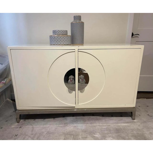 Elegant Jonathan Adler piece. This crisp white piece is a perfect addition to any modern place. I purchased it in...