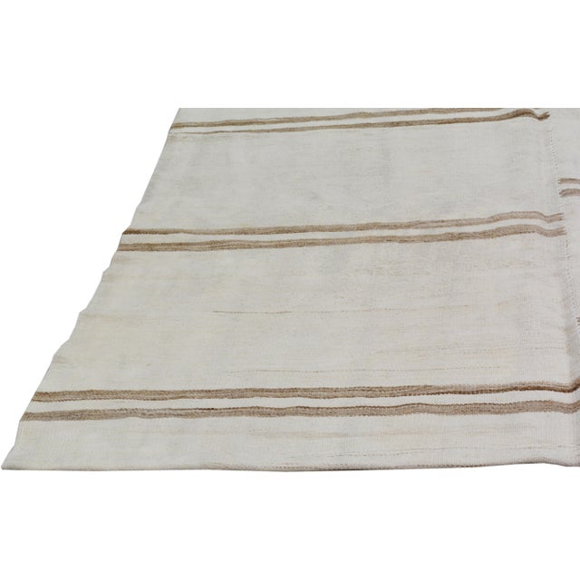 Flatweaved with care using traditional rug-making techniques, this hemp rug blends timeless craftsmanship with a modern...