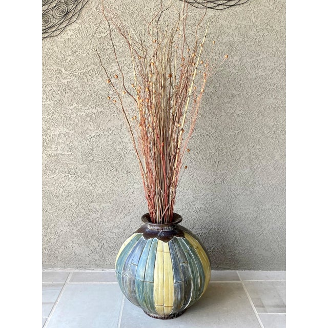 Excellent Pre-Owned Condition. Note: Dried foliage is not included. This gorgeous floor vase once graced a corner on a...
