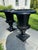 Assembled pair of monumental neoclassical cast iron urns with unusual smooth rims and scrolled volute handles made in the...
