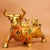 This charming sculpture depicts a standing ox or bull, a traditional symbol of strength, diligence, and wealth. The figure...