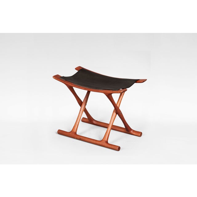 A refined example of danish modernism, this egyptian stool was designed by ole wanscher in 1957 and produced by pj møbler...