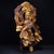 This is a monumental and highly intricate sculpture, masterfully carved to resemble translucent amber or aged horn. The...