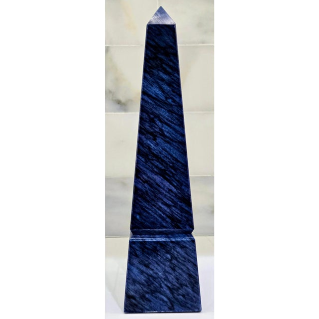 Elevate your shelf, desktop, or console with this striking blue marble obelisk by Great City Traders, San Francisco....