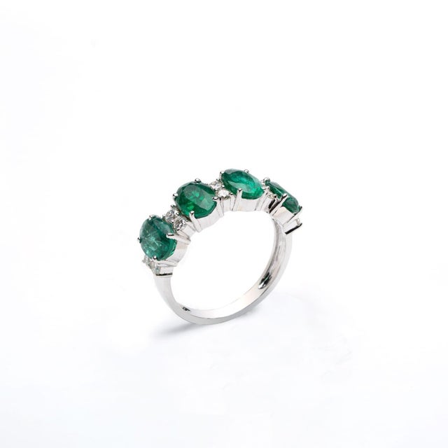This is an amazing natural Zambian emerald ring with 3 carats emerald which is of very high quality and diamonds 0.42...