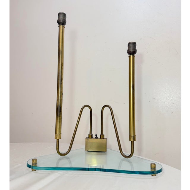 Up for sale is a large vintage mid-century modern glass and brass triangular base lamp attributed to Fontana Arte. It...