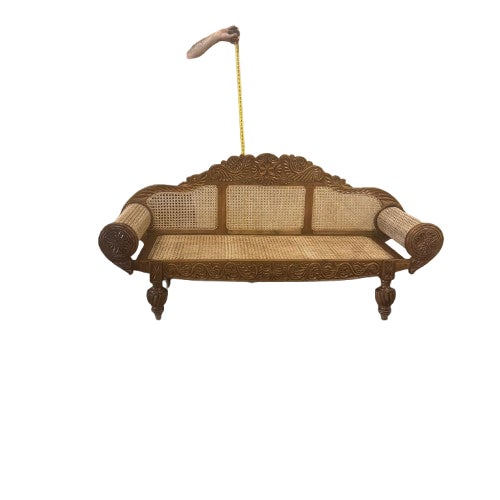 Bring timeless British Colonial elegance into your home with this beautifully crafted cane settee from the 2000s, at the...