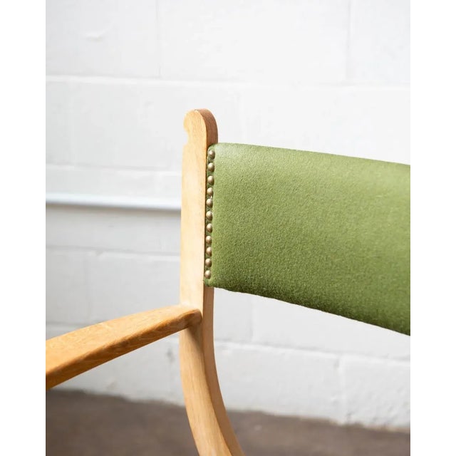 The "Kurul" chair, attributed to Danish architect and furniture designer Henning Kjærnulf in the 1960s, is a striking...