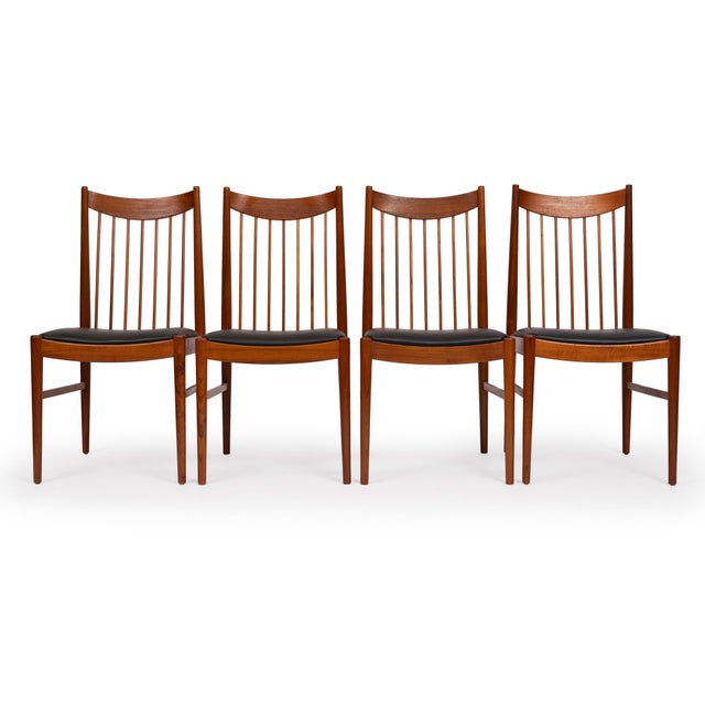 Designed by renowned Danish designer Arne Vodder for Sibast Møbler, this iconic set of four Model 422 dining chairs is a...