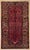 Antique hand-knotted rug from the Hamedan region of western Iran, featuring an elongated field with an allover repeating...