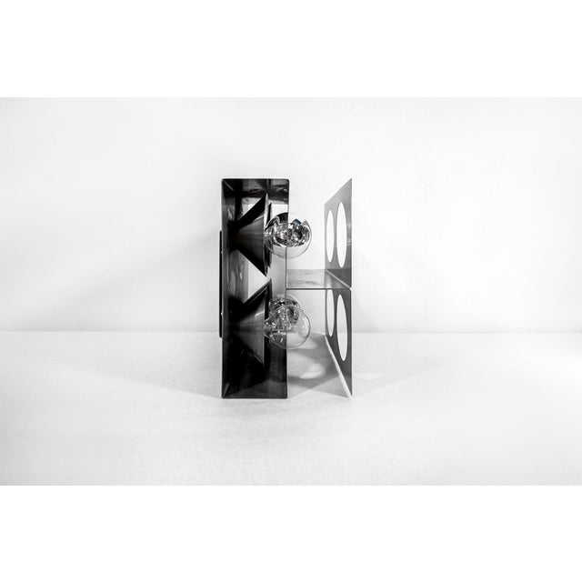 Sculptural light with four steel lights Manufacturer: Roche Bobois 1970s I have official proof of authenticity such as...