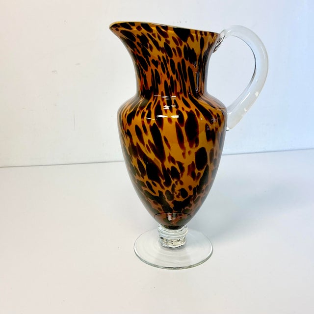 From our private collection. We curated this gorgeous Venetian Hand Blown Glass Pitcher in Italy in the late 1980s. It...