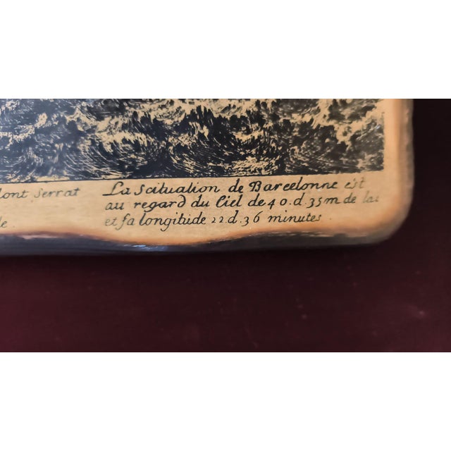 A magnificent decorative piece reproducing the historic engraving "Barcelona, ​​Capital of Catalonia" by the renowned...