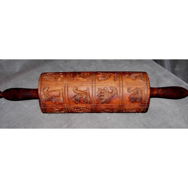 Offered here is a circa 19th century Springerle Wooden Rolling Pin with 24 different carved stamp blocks, each one being...