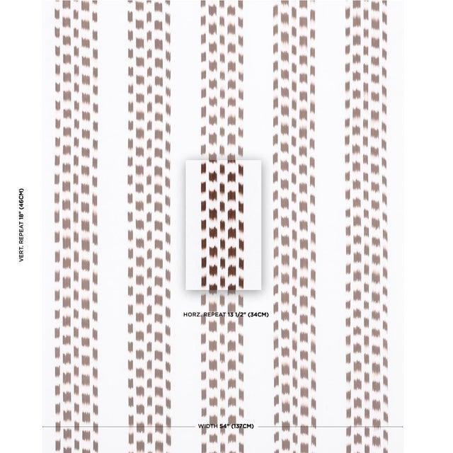 Using a traditional, artisanal weaving technique, Izmir Ikat Stripe in cocoa is intentionally irregular, emphasizing the...