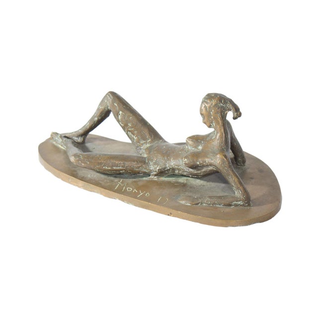 A bronze sculpture of a nude female figure by the Romanian artist Prince Monyo Simon Mihailescu-Nasturel (born 1926). The...