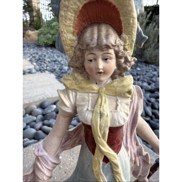 Offered is a beautiful antique German porcelain figurine by Volkstedt Rudolstadt, dating to the late 19th / early 20th...