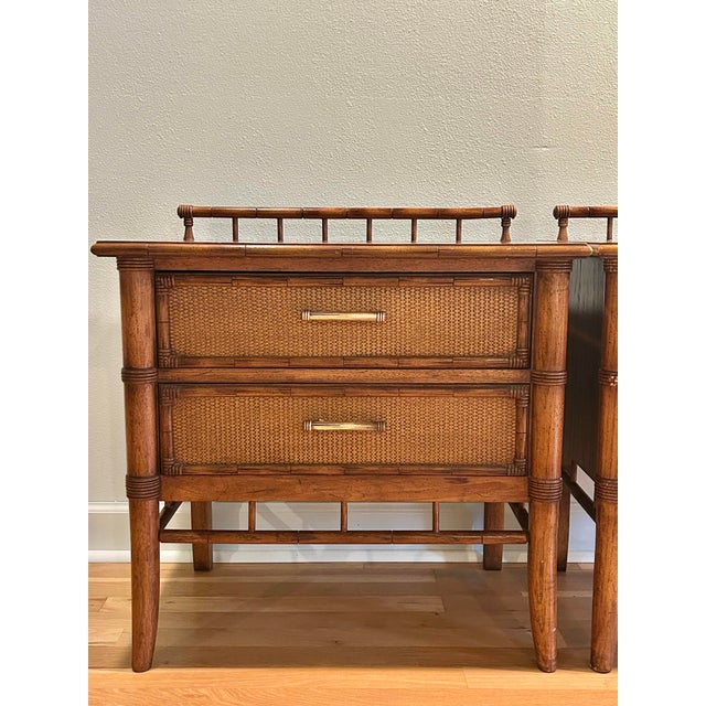 This pair of chinoiserie faux bamboo nightstands was produced by Thomasville in the 1970’s. The makers mark on the back...