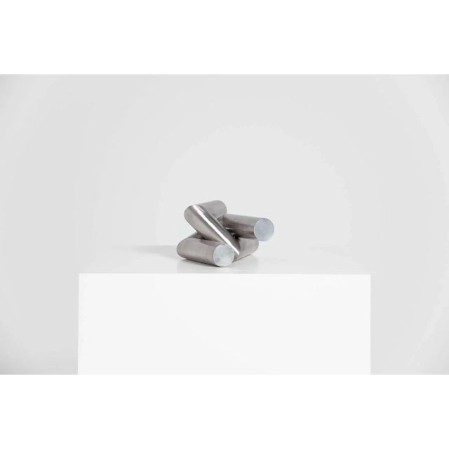 Very nice abstract tangled tubes sculpture designed by Rudolf Wolf and manufactured in his own atelier ca 1975. This...