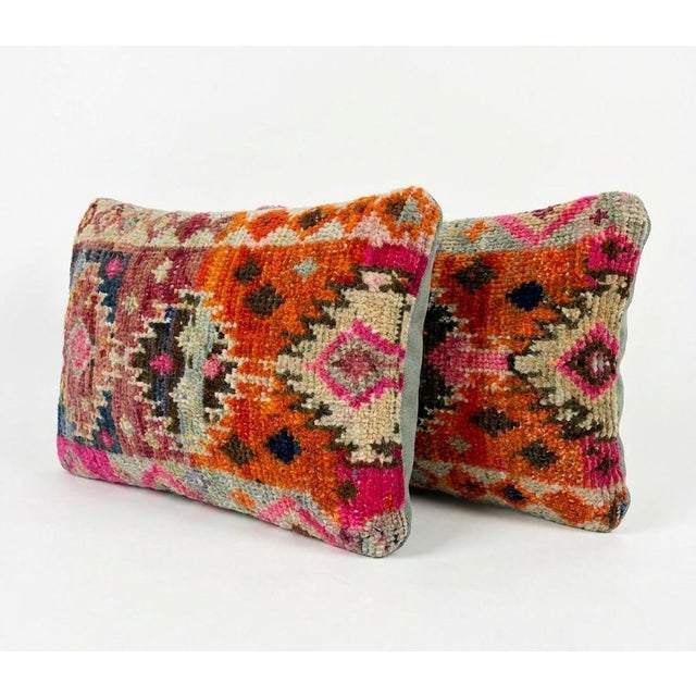 This beautiful 16'' x 24'' pillow cover set was made from authentic Turkish rug pieces. Bright colors of wool adorn the...