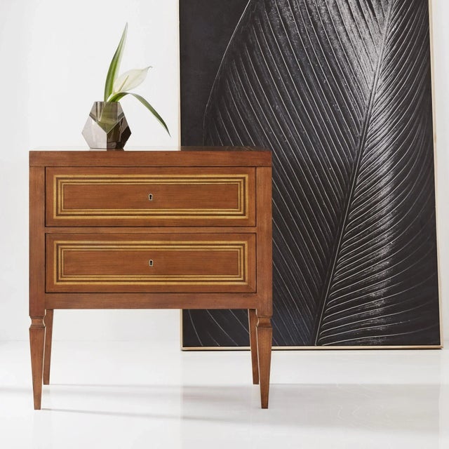 Honoring the craftsmanship and quality of the past, this gorgeous furniture piece is shure to become a modern-day...