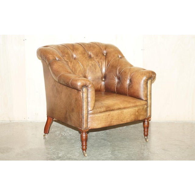 Royal House Antiques is delighted to offer for sale this stunning George Smith cigar brown Somerville occasional Library...