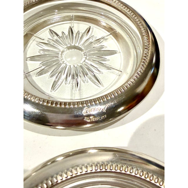 This set has expanded to 12 coasters!! Pick them up now! This lovely set of Italian-made glass & silver plate coasters was...