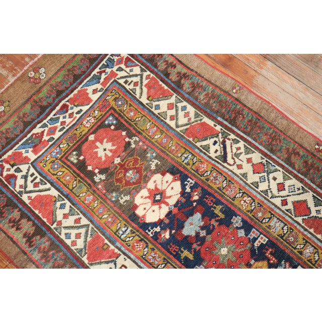 An early 20th century Persian Serab Decorative Tribal Runner Measures: 2'10'' x 12'4''