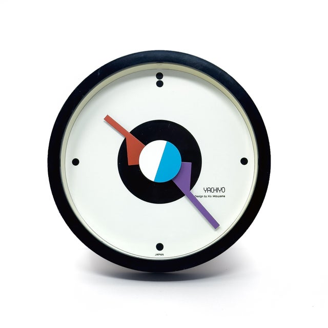 An outstanding round postmodern wall clock designed by Ko Mizuyama, a prolific Japanese designer of clocks in the 1980s....