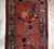 Handmade antique Art Deco Chinese rug in red shade with greyish border. The rug has traditional floral Art Deco design. It...