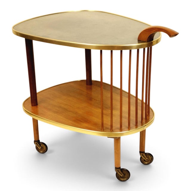Elegant Mid-Century Modern bar cart / serving trolley from the 1960s, showcasing an organic, kidney-shaped asymmetric two-...