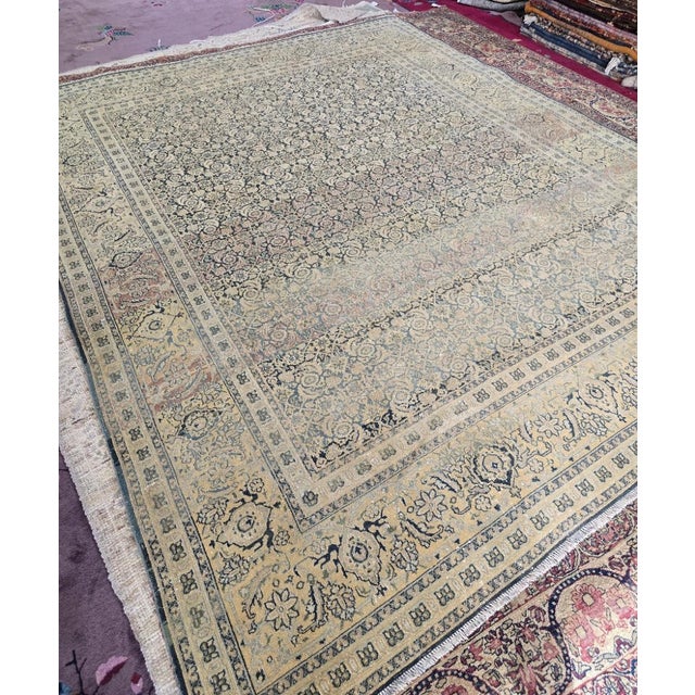 This exquisite Persian Tabriz rug from the 1930s exemplifies the sophistication and artistry of one of the most celebrated...