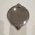 Silver mirror. 221 grams. Height: 6.3 in (16 cm) Width: 5.12 in (13 cm) Depth: 0.4 in (1 cm) This piece has an attribution...