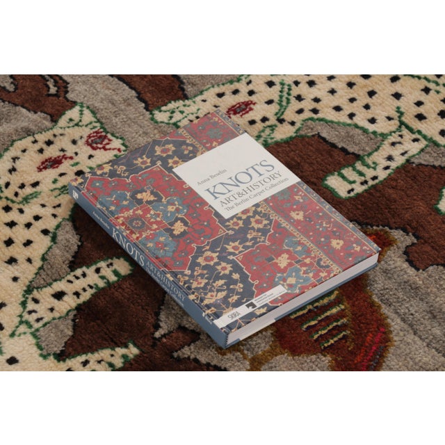 Hand-knotted in wool and originating circa 1950-1959 from Afghanistan, this 3x6 vintage Gabbeh runner joins Rug & Kilim’s...