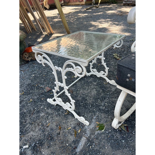 Elevate your outdoor space with this exceptional 5-piece vintage Meadowcraft wrought iron patio set, crafted in the 1960s....