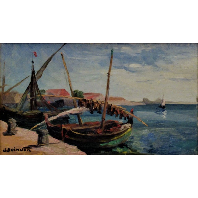 This artwork "Port en Provence" c. 1920 in an oil painting on canvas by noted French artist Jean Guindon, 1883-1976. It is...