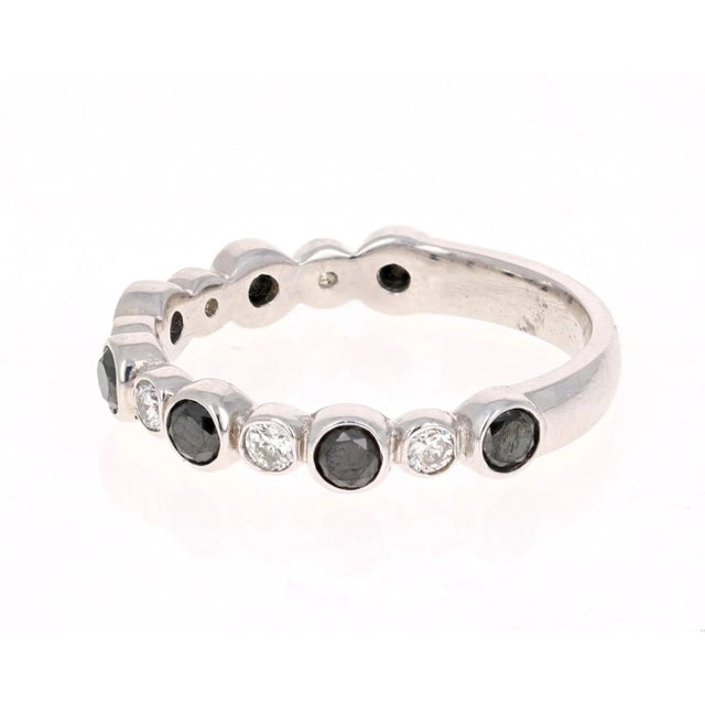 Cute and Dainty 0.75 Carat Black Diamond and White Diamond Band that is sure to be a great addition to anyone's accessory...