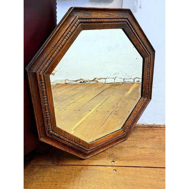 Early 20th Century Octagonal Oak Wall Mirror, circa 1925 Material: Oak, Mirror Glass A charming early 20th century English...