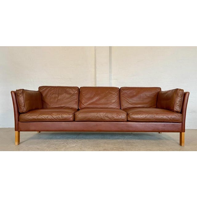 Made in Denmark and designer by Mogens Hansen, this sofa is a truly classic and elegant piece of furniture. Made from very...