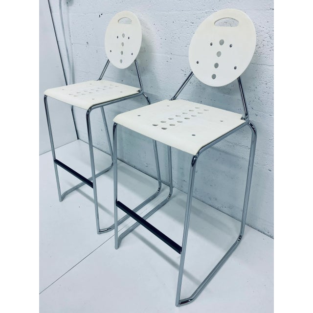 Pair of Postmodern Memphis style barstools by Carlo Bimbi and Nilo Gioacchini for Segis Italia, circa 1980s. Chairs are...
