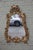 19th century carved giltwood Rococo style mirror with acanthus leaves and carved shell design.