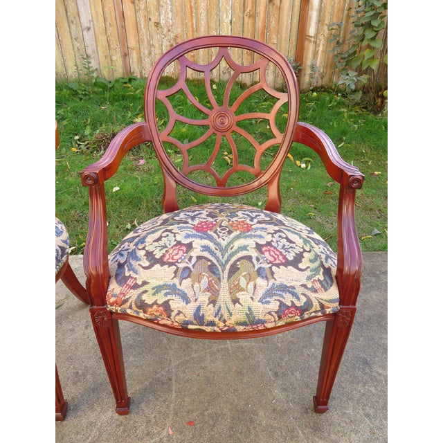 Nice vintage pair of mahogany spider back captain's accent side chairs. Chairs were custom made for the original owner, by...