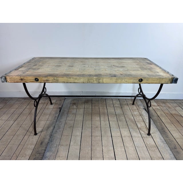 Brutalist coffee table in wood and forged, handcrafted in the 1980s. The tabletop has been stripped, the legs have been...