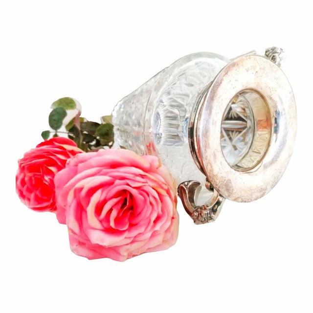 Add a touch of class to your table with this vintage cut glass and silver metal jug, a refined piece that evokes the...