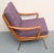 50s boomerang armchair. Made in cherry wood solid, 4 brass legs. The pads were newly made, hue of the fabric is a violet....