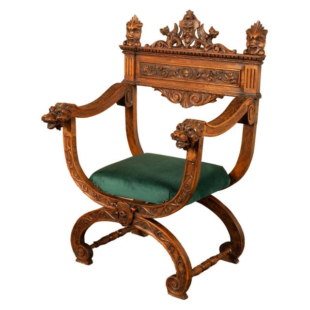 Antique 19th Century Italian Renaissance Revival carved Savonarola chair circa 1890. This chair carved of fine walnut is a...