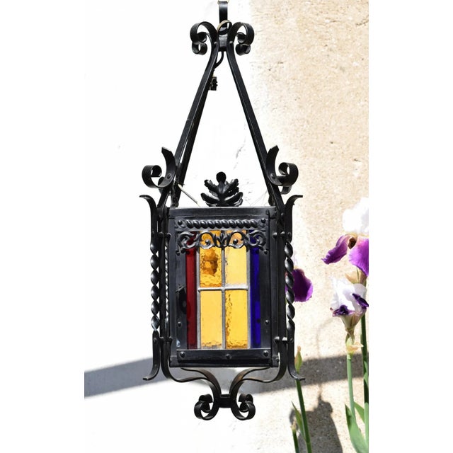 Bring timeless elegance and a warm, colorful ambiance to your home with this authentic vintage French lantern from the...