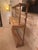 Beautiful antique baker's rack/buffet for displaying your favorite dishes or treasures! The wood grain on this piece is...