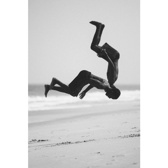 Contemporary Photography “Beach Boys Series 2 - 3 ” by Douglas Condzo Young Fishermen playing at Macaneta beach in Maputo...