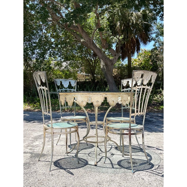 Channel vintage fairground elegance with this whimsical wrought iron carousel dining table. Designed with artistic flair,...